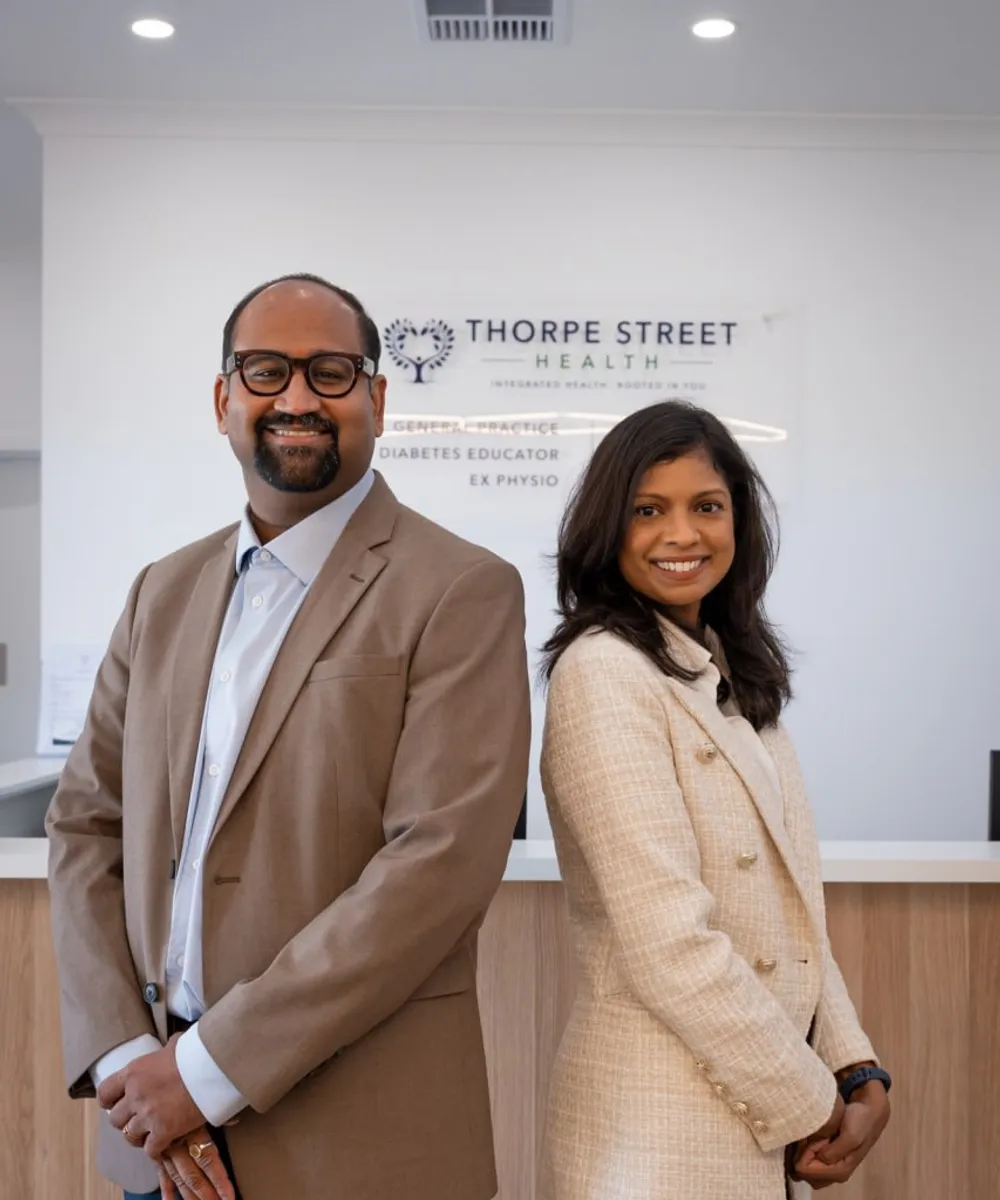 Dr Ashwin Menon and Dr Ranjitha Ananda Kumar at the front desk of the clinic