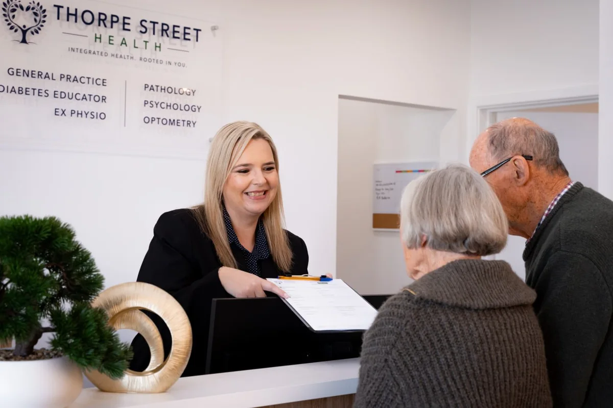 Patients being welcomed at the Thorpe Street Health reception desk