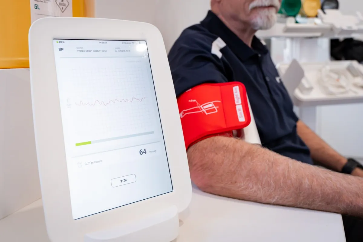 A patient having their blood pressure taken during an assessment at Thorpe Street Health