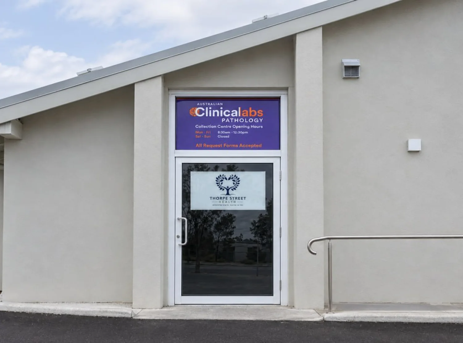 The entrance to the Australian Clinical Labs collection centre at Thorpe Street Health, with the pathology sign above the door listing collection hours of 8:30am to 12:30pm Monday to Friday